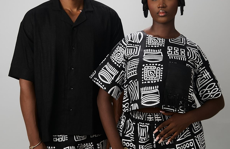 A stylish African man or woman wearing a luxury 1